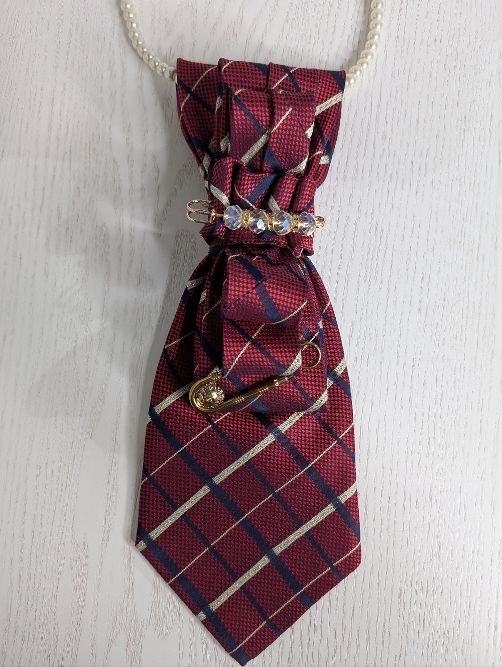 Pearl-Accent Burgundy Plaid Bow Necklace with Gold Charm
Handmade